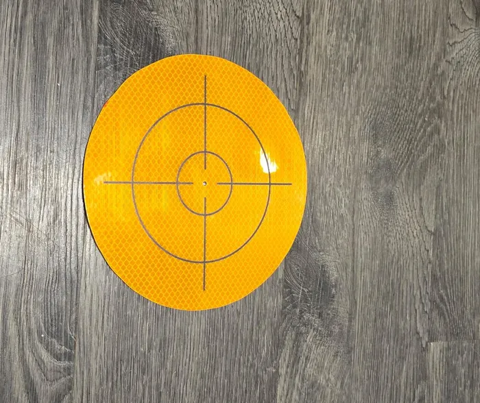 Small circular orange reflective target