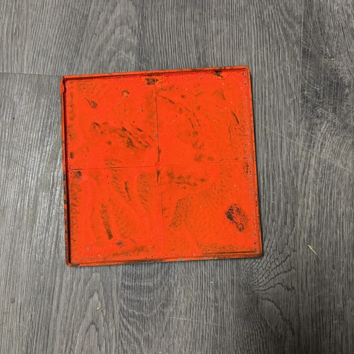 Orange spray-painted 3D printed target