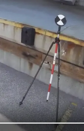 Black and white target on a survey tripod
